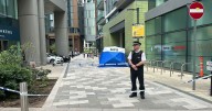 Woman in 20s dies after fall 'from height' near Canary Wharf tower block