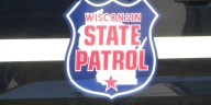 One person dead after crash between motorcycle and semi