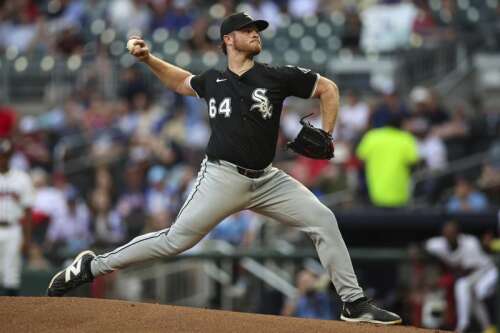 Baldwin's 2-run single in 8th caps 6-run comeback as Braves rally past White Sox 11