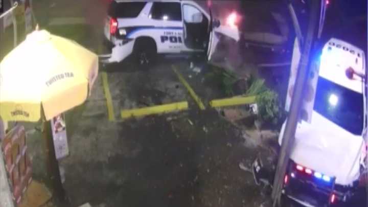 Surveillance video captures 2 Fort Lauderdale Police cruisers crashing into each other outside food market