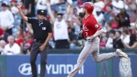 Lux hits 2-run homer, Singer pitches triple