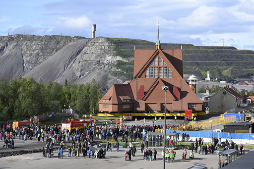 How do you move a beloved Swedish church down the road? With prayer, engineering and some Eurovision