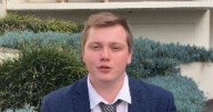 Student stands by 'principle' after attempted cash payment for parking lands him in court