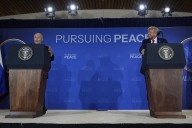 The Latest: Meeting between Trump and Putin on Russia