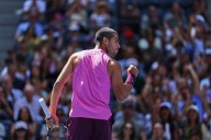Carlos Alcaraz uses some behind-the-back magic to win a US Open point against Rinderknech