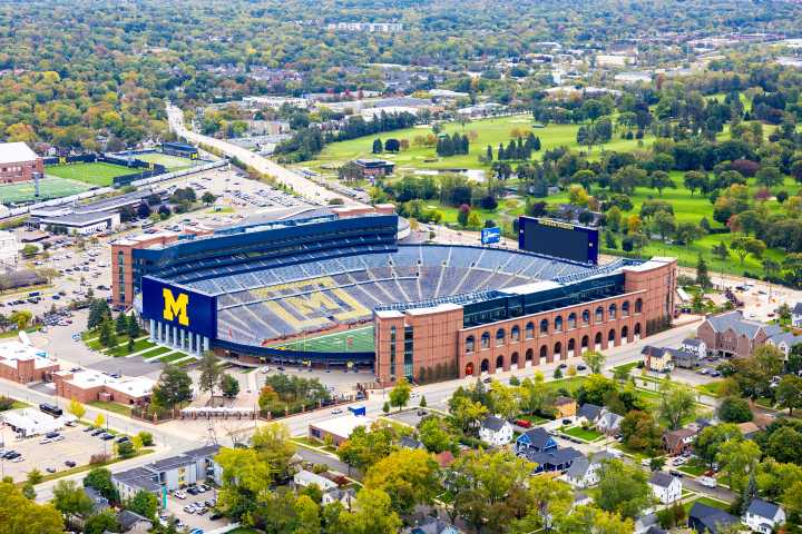 NCAA imposes fine and additional suspension for Moore in Michigan sign stealing scandal