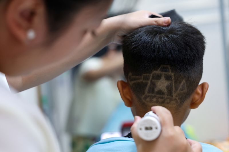 China parade inspires military-themed haircuts for children