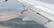 Plane horror as wing flap breaks midair with terrified passengers watching in shock
