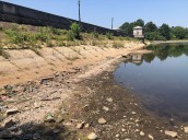 Hidden structures and debris revealed as water levels sink to shocking low in Silver Lake Park