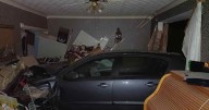 Dramatic moment car smashes through Midlands living room while family are inside