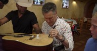 How a legendary dinner with Randy Travis, Coffey Anderson and a signed guitar came to be