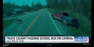 Truck caught passing school bus on camera