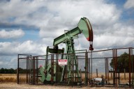Oil edges lower as market ponders potential Russia