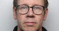 Doctor caught with 'paedophile manual' and 90,000 sickening images