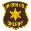 Grand Blanc man dies after vehicle hits guardrail, goes off road in Huron County