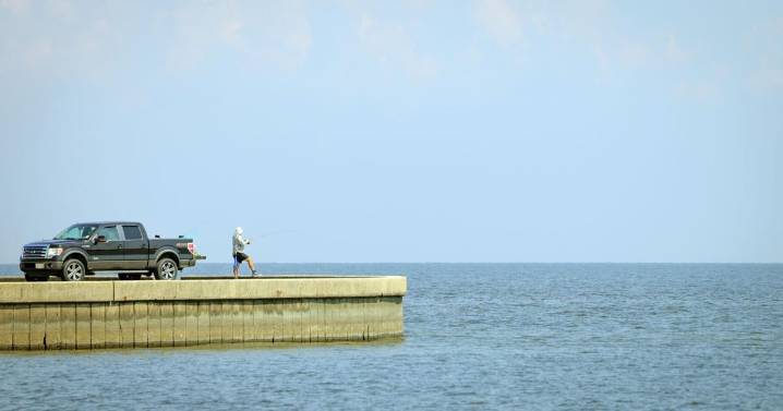 A small waterspout crossed over Lake Pontchartrain on the morning commute. See video.