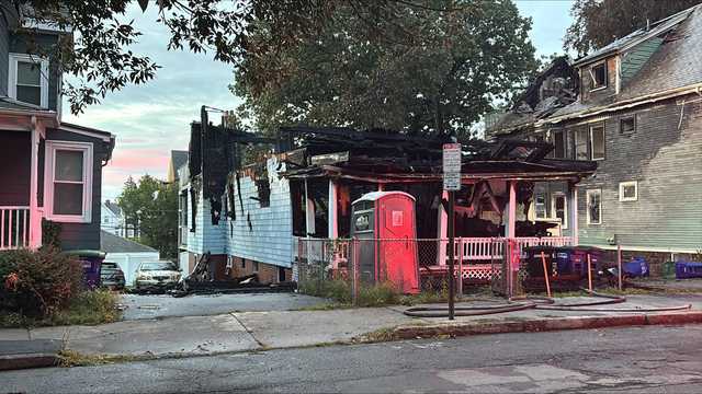 Home engulfed in fire collapses in Somerville; flames spread to neighboring homes