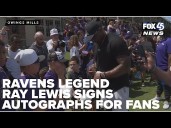 Ravens Hall-of-Famer Ray Lewis signs autographs for fans at training camp