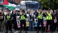 Rival protesters clash outside asylum seeker hotel