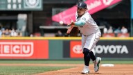 Mariners' Josh Naylor grimaces after swing, exits early