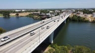 ‘Workers over billionaires’ march on 281 bridge
