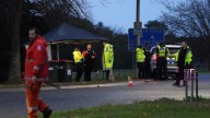 Victoria police shooting: 'Cop killing conspiracy theorist could be hiding in cave' as his family hand themselves in