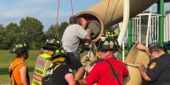 PHOTOS: Connecticut officials rescue man stuck in playground slide