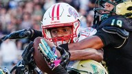 Emotion in motion: Athlete's cool catch lands Photo of Week honors