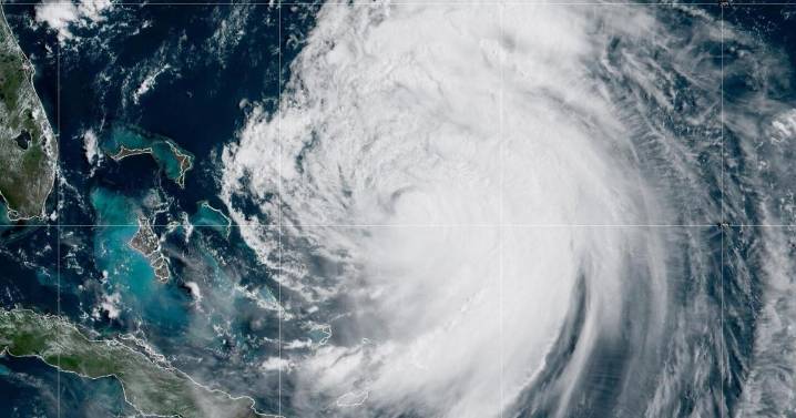 Evacuations in North Carolina as Hurricane Erin grows in size, two waves on its heels