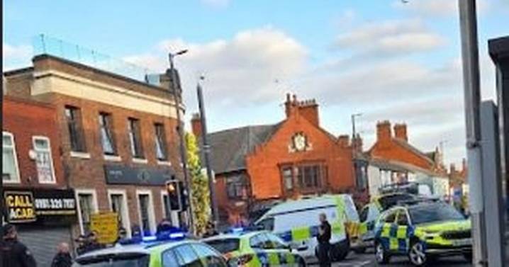 Police issue update after armed cops swoop on bare-chested man in town centre