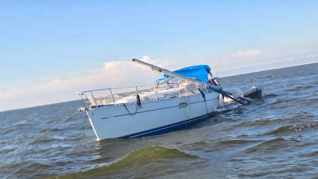 Sailboat hits Causeway; man missing, woman rescued