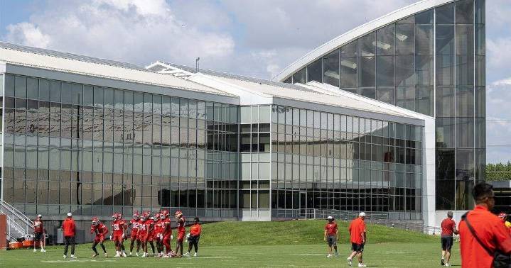A bullet broke through Chiefs coach Andy Reid’s office while he was inside