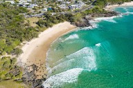 Surfer Escapes 'Savage' Shark Attack with Surfboard Bitten in Two