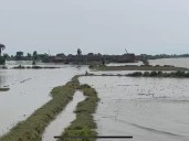Riverine settlements drown as India warns of more floods 