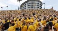 College football traditions: 'Hawkeye Wave' bonds everyone in stadium with kids in adjacent hospital