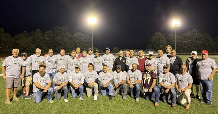 Halftime ceremony during opening week win honors 1995 state champion football teams from Le Roy and Cal