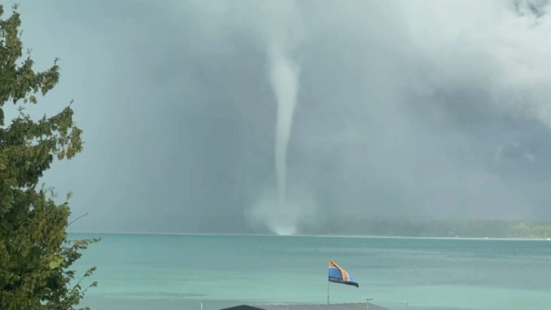 Watch: Tornadic waterspout spins over Michigan lake