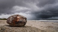 Storm clouds, coconut on Cocoa Beach roll into Photo of the Week spot