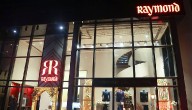 Income Tax Officials Conduct Survey Action At Raymond Offices Across India