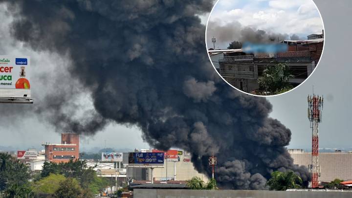 Gran incendio consume una propiedad en el barrio Villacolombia, oriente de Cali; una nube de humo cubre la zona