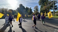 Caregiving workers continue to strike as they demand pension security