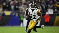 Chargers RB Najee Harris carted off with leg injury vs. Broncos