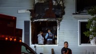 Police Seek Suspect After Firefighters Find Dead Couple, One in Chains
