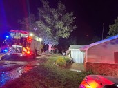 Western Taney County firefighters battle house fire
