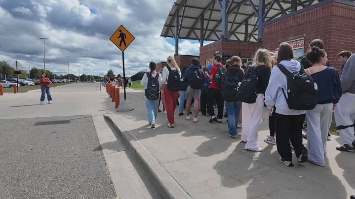 Hundreds of Rockford High School students walk out of class for gun violence awareness