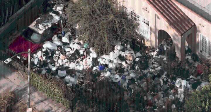 Infamous 'trash house' once again surrounded by garbage in LA