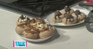 Decorating fall-themed donuts with Chef Alekka