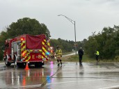 Van runs off road, ends up on its side in southwest Lincoln