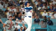 Ohtani hits 50th homer after pitching five hitless innings