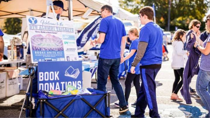 BYU ‘COUGS CARE’ Supports Families & Communities In Road Football Cities